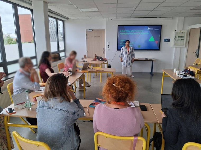 Lali Banerji teaching a seminar on critical thinking to an international group